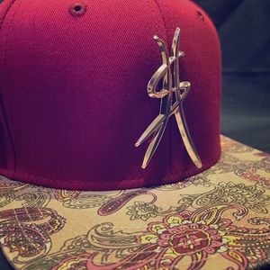 A burgundy unisex Side Hussle Hat